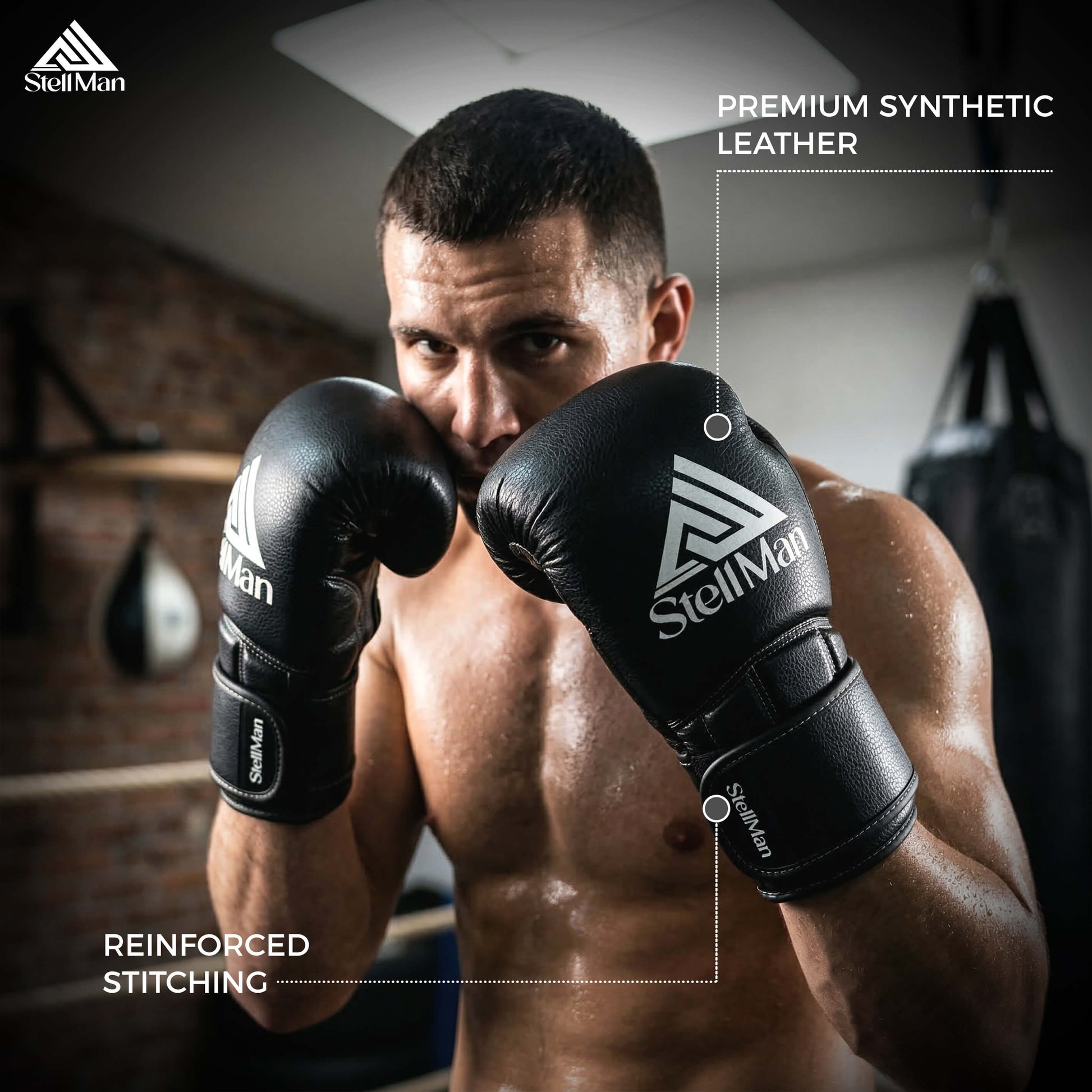 Man wearing StellMan boxing gloves in a gym setting